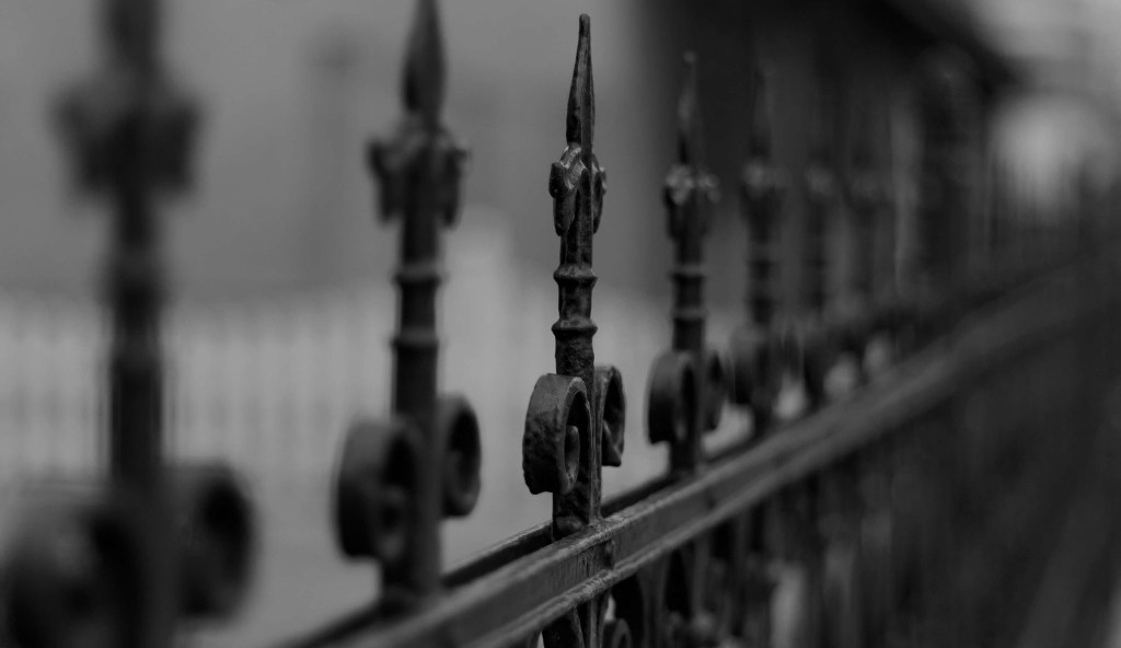 Behind Wrought Iron
